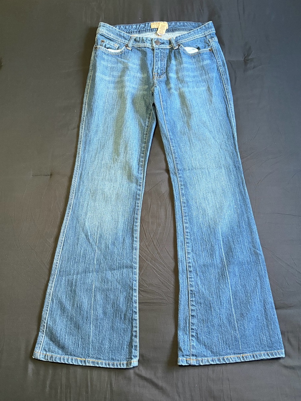 Ultra lowrise Steve and Barry’s flared blue jeans size 6